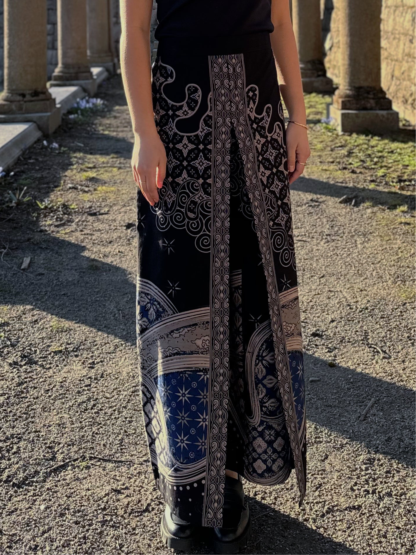 Close up of Model wearing a Avery pants in black