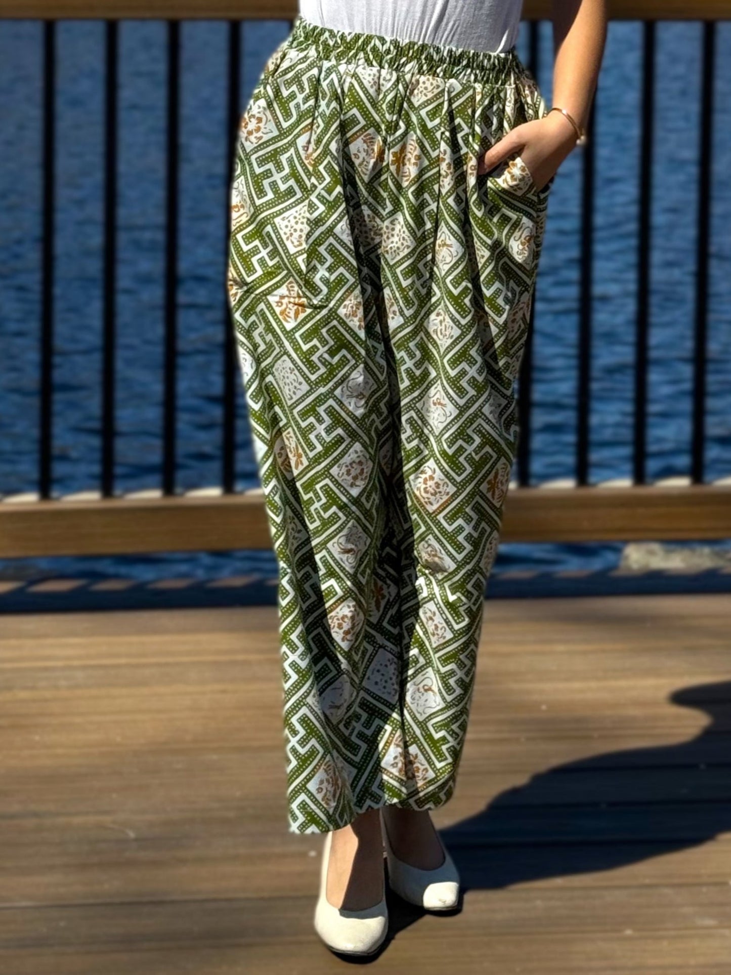 Close up view of the light green Nami barrel pants