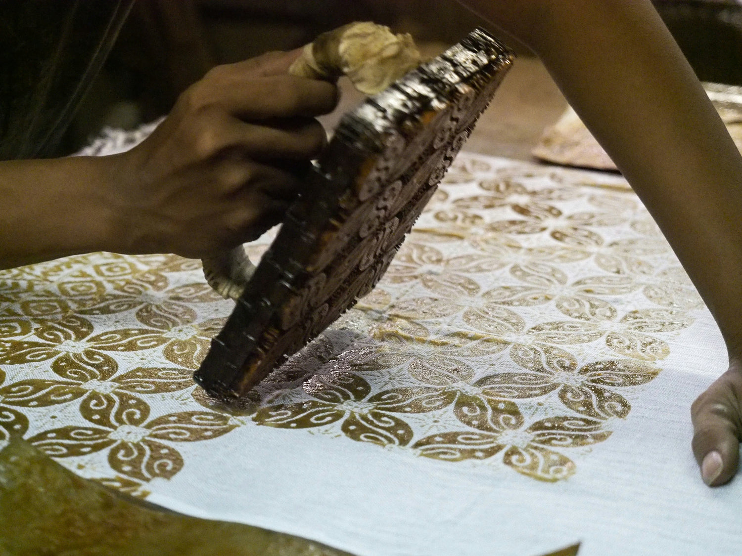 process of handmade batik with copper stamp