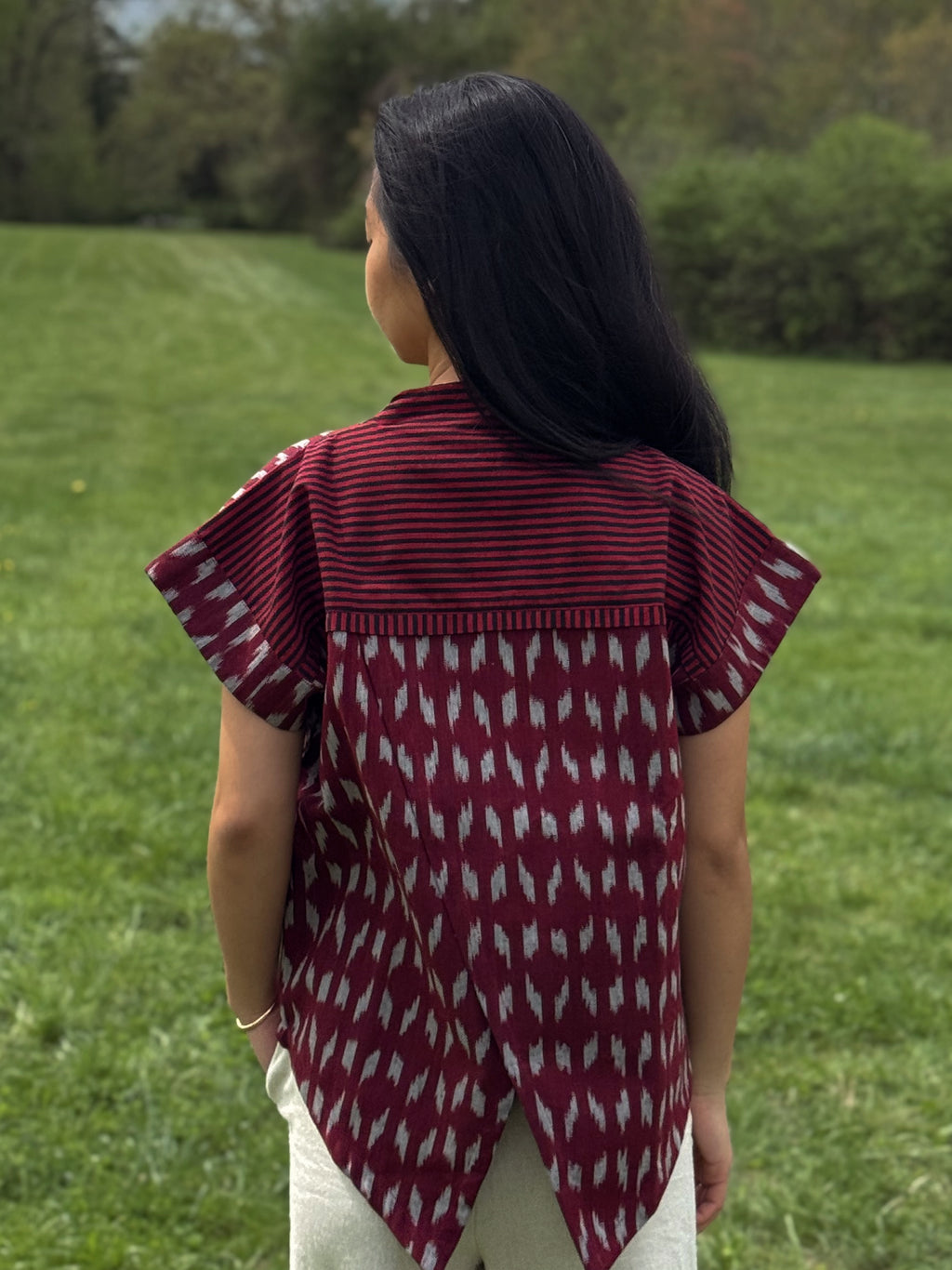 Back view of Adelia top showcasing the overlay pattern.