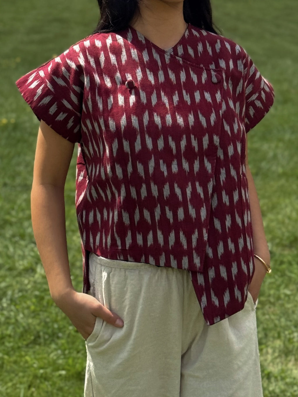 Close up of red woven Adelia Blouse Top