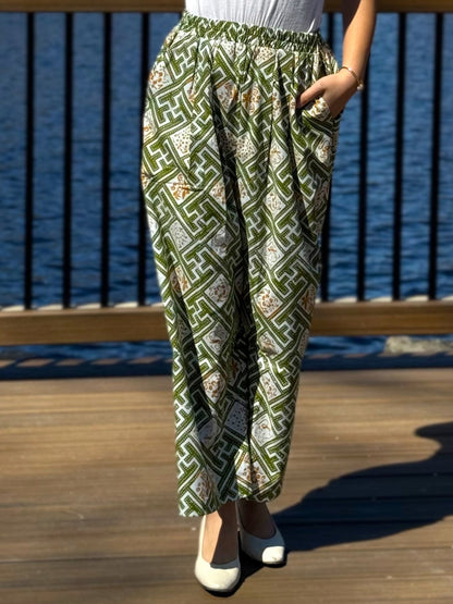 Close up view of the light green Nami barrel pants