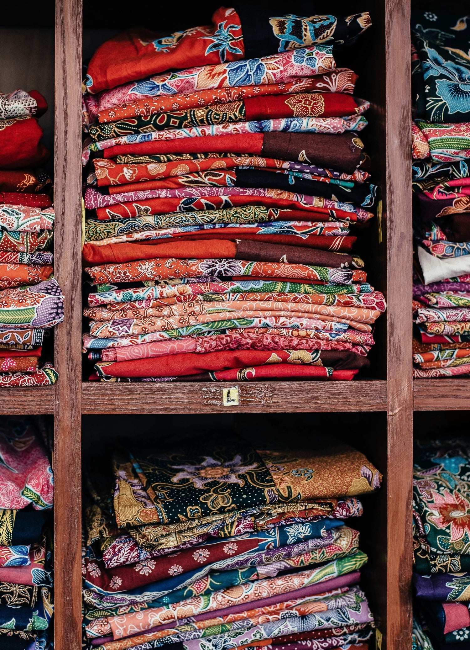 image of stacks of batik fabric 