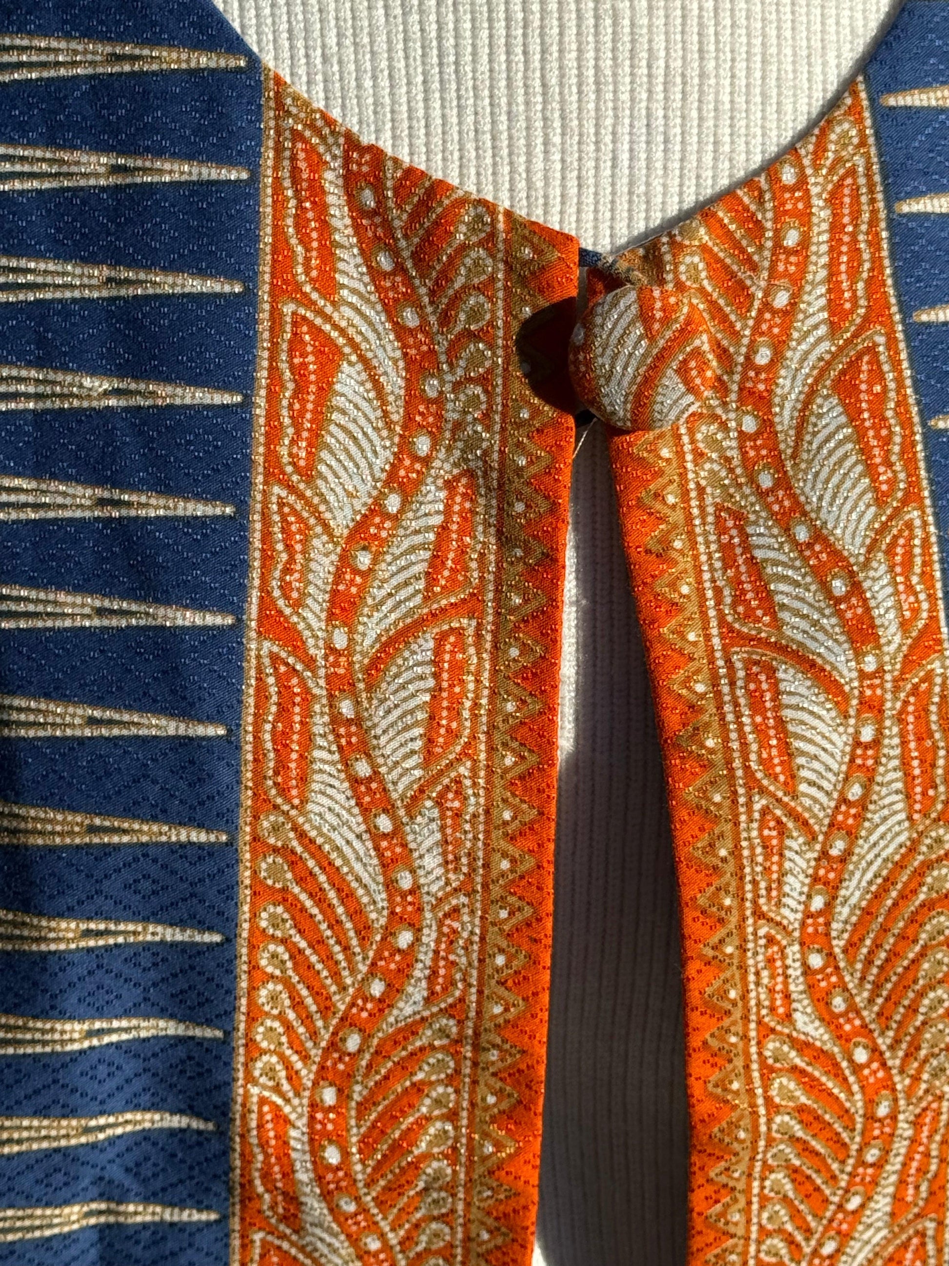 Detail Shot of "Poppi" Buttoned Sleeveless Vest - Mutiara Heritage