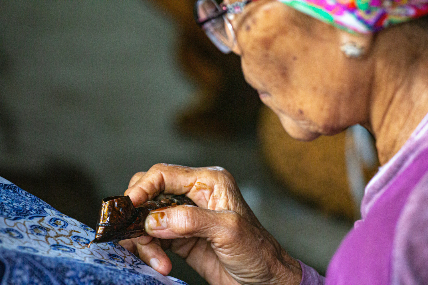 Detail shot of batik hand drawing process