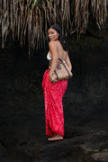 Model posing with Esme Bag behind her.