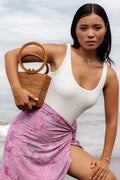 Model holding Galia bag on her side