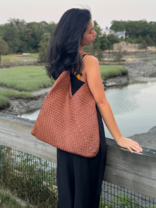 Model wearing Giana leather bag over the shoulder