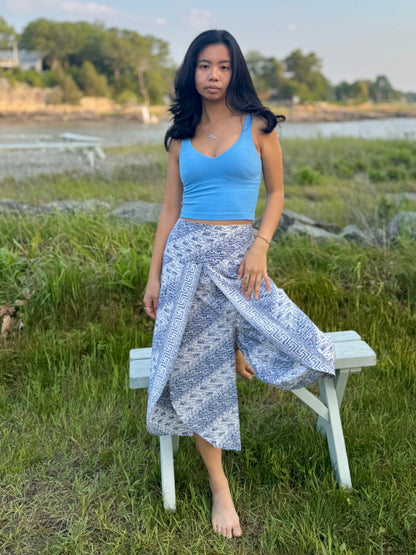 Front view of blue-patterned Hanna Capri Pants with Wrap style slit design 