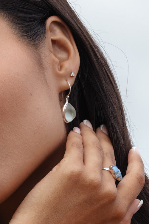 Close up image of the Silver Sea Glass earring by Mutiara Heritage.