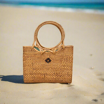 Rattan ata vine bag placed on a beach