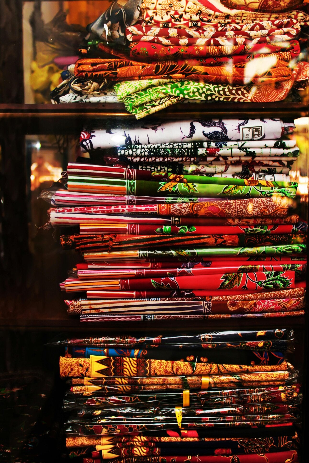 stack of batik fabrics 